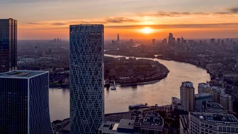 Sunset to night time lapse view through the skyscrapers of Canary Wharf Stock Footage 264157567