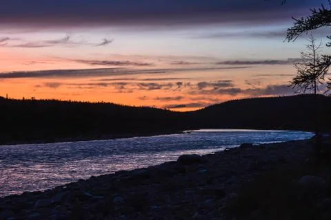 Sunset on the North river. Stock Photos