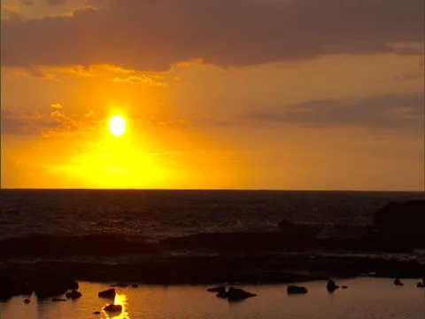 Sunset with Ocean and Tidepool Stock-Footage 22243415