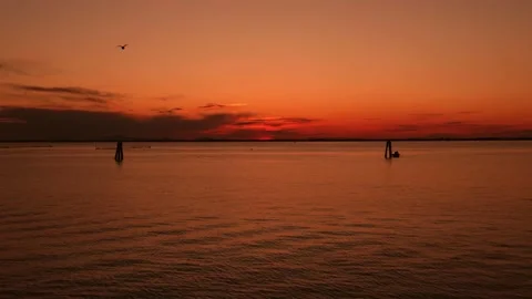 Sunset at ocean bay waves slow motion aerial view. Stock Footage 194781749