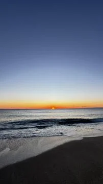 Sunset ocean beach 4 Stock Photos