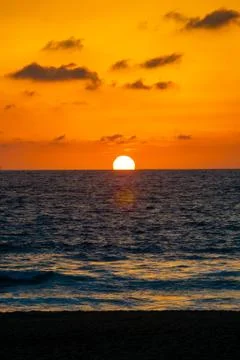Sunset on the ocean, beach Stock Photos