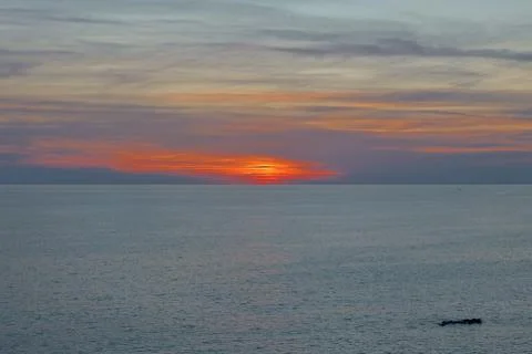 Sunset ocean beach Stock Photos