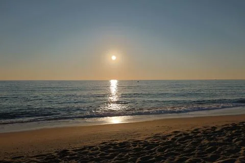 Sunset ocean beach Stock-Fotos