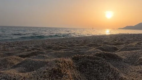 Sunset ocean beach Stock Photos