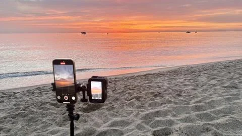 Sunset ocean beach Stock Photos