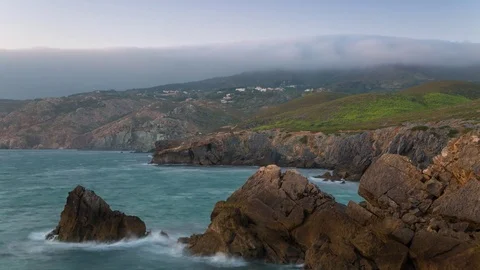 Sunset by the ocean beach Portugal Stock Footage 84521177