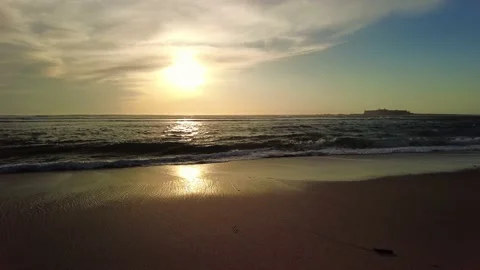 Sunset ocean beach. Waves with ripples on the water surface. Summer landscape Stock-Footage 153224609