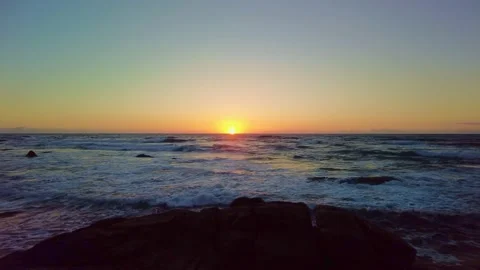 Sunset ocean beach. Waves with ripples on the water surface. Summer vacation Stock-Footage 154391659