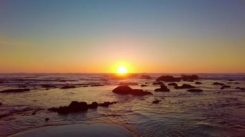 Sunset ocean beach.Calm sea waves. Sun reflection on the water surface. Splash Stock-Footage 154393165