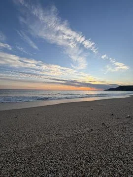 Sunset ocean beach.Ocean sunset clouds Stock Photos