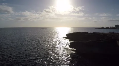 Sunset on a Ocean Cliff - Aerial Flight Stock Footage 52460431