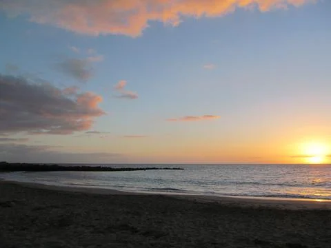 Sunset ocean coast Stock Photos