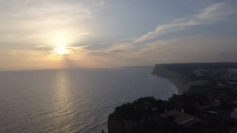 Sunset Ocean Coast - Smooth downwards movement Vidéo 98368354