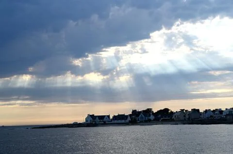 Sunset on the ocean, like a divine light Stock Photos