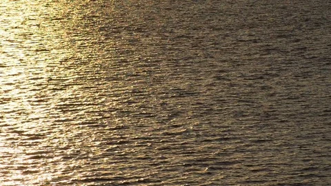 Sunset in the ocean from a high view Stock Footage 81144073