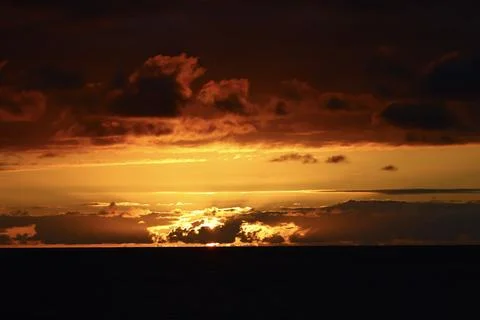 Sunset ocean horizon with dense cloud contrast in Tenerife Canarias Fotos Stock
