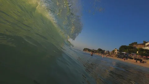 Sunset in the ocean with incoming waves  in slowmotion Video stock 90004889