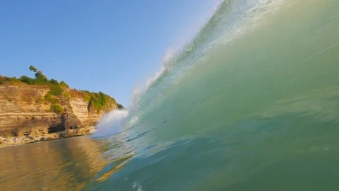 Sunset in the ocean with incoming waves  in slowmotion Video stock 90004930