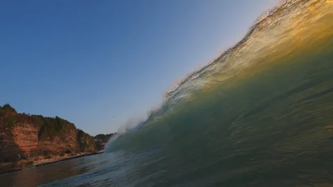 Sunset in the ocean with incoming waves  in slowmotion Video stock 90005894