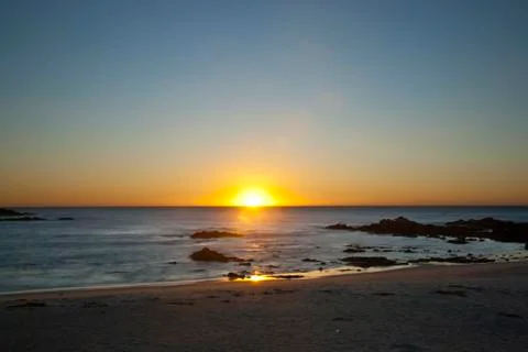 Sunset at ocean Stock Photos