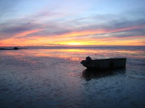 Sunset by the ocean Stock Photos