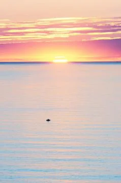 Sunset on the ocean Stock Photos