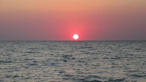 Sunset in the ocean Stock Photos