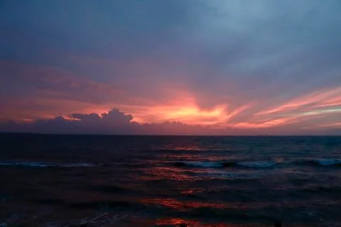 Sunset by the ocean Foto stock