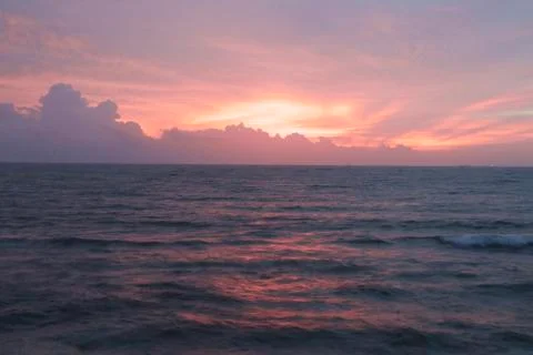 Sunset by the ocean Stock Photos