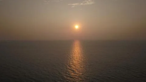 Sunset by the ocean Stock Photos