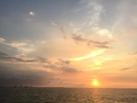 Sunset by the ocean Stock Photos