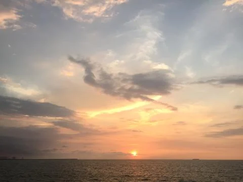 Sunset by the ocean Stock Photos