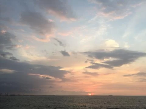 Sunset by the ocean Foto stock