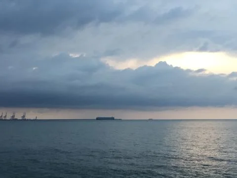 Sunset by the ocean Stock Photos