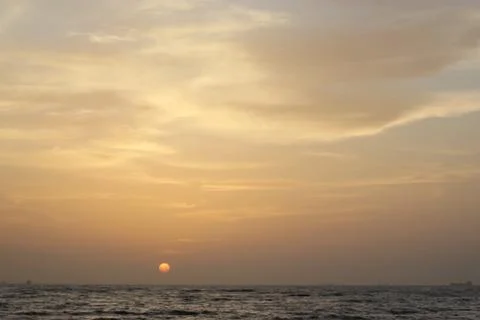 Sunset by the ocean Stock Photos