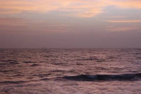 Sunset by the ocean Stock Photos