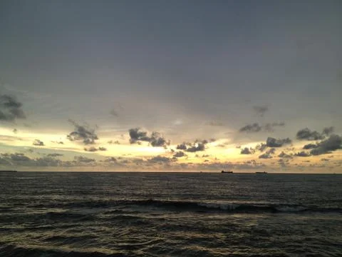 Sunset by the ocean Stock Photos