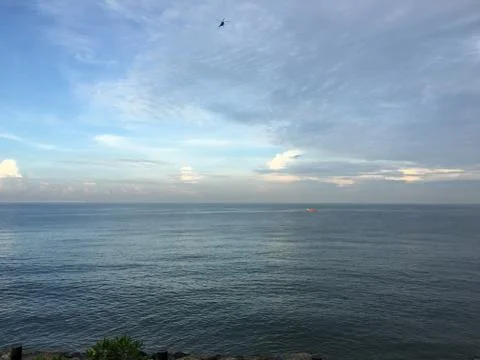 Sunset by the ocean Stock Photos