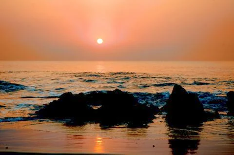 Sunset Ocean Rocks Stock Photos