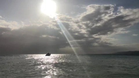 Sunset on the ocean. Sailing boat at sunset Video stock 104453974