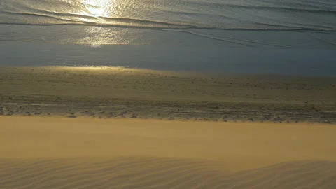 Sunset by the ocean on a sandy beach, in Jericoacoara, Brazil Stock Footage 231557159