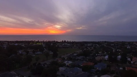 Sunset ocean suburb clouds horizon aerial footage collection Stock Footage 104121339