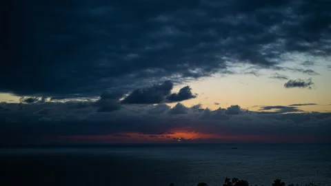 Sunset Ocean Timelapse with Billowing Clouds Stock Footage 222817093