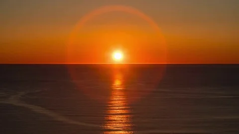 Sunset into the ocean timelapse Stock Footage 77957781