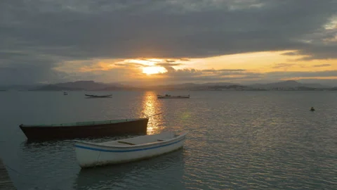 Sunset by the ocean with typical boats, in Florianopolis, Brazil Stock Footage 231534684