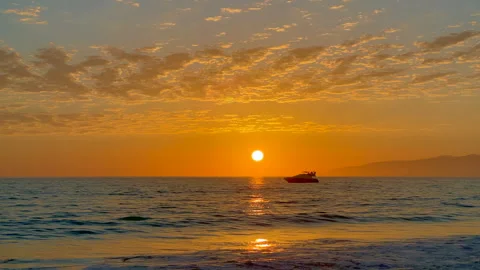 Sunset ocean view with a boat at Venice beach Stock Footage 272344914