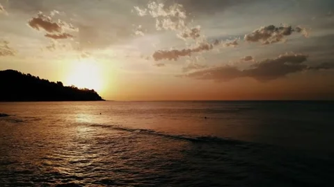 Sunset ocean view, golden hour coast, tranquil sea scene Stock Footage 311094997
