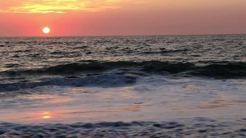 Sunset, ocean, waves close to camera Stock Footage 78006986