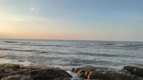 Sunset Ocean Waves Crashing on Rocky Shore Beach Stock Footage 341509065